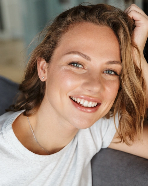 Patient smiling after receiving cosmetic treatment at Powers Dental Group in Colorado Springs