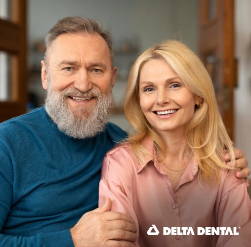 Smiling couple representing patients with accepted Delta Dental insurance benefits.