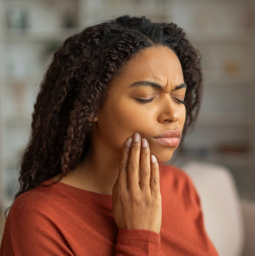 Patient experiencing tooth pain seeking emergency dentistry