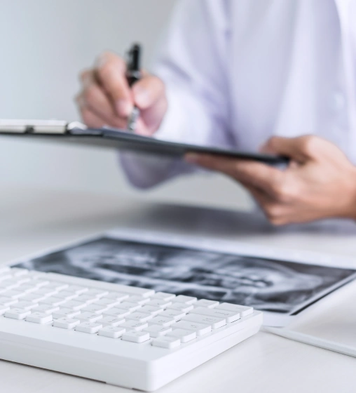 Paperwork related to dental insurance and payment plans.