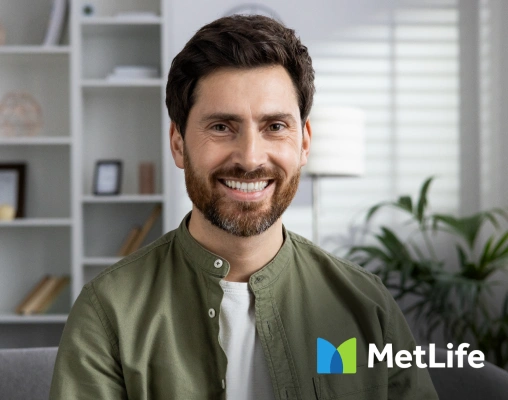 Smiling man promoting MetLife dental insurance benefits.
