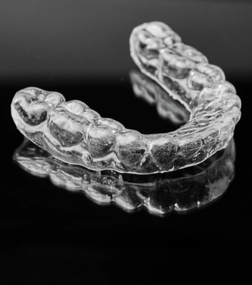 Custom night guard designed to protect teeth from grinding and clenching