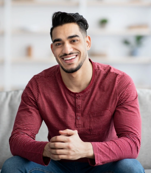 Smiling patient representing restorative dentistry treatment.