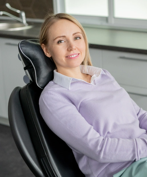 Relaxed patient receiving comfortable sedation dentistry treatment