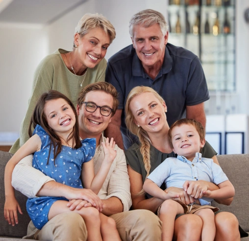 A happy family representing comprehensive dental services for all ages.