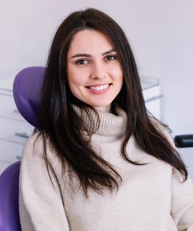 Smiling patient at Powers Dental Group after personalized dental care from a trusted family dentist in Colorado Springs