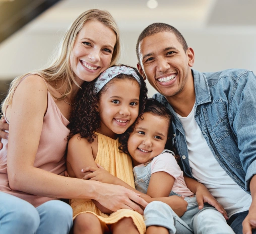 Happy family during a personalized dental smile consultation at Powers Dental Group